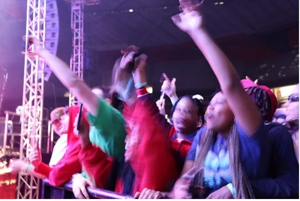 Students filming a concert experience at the Dome