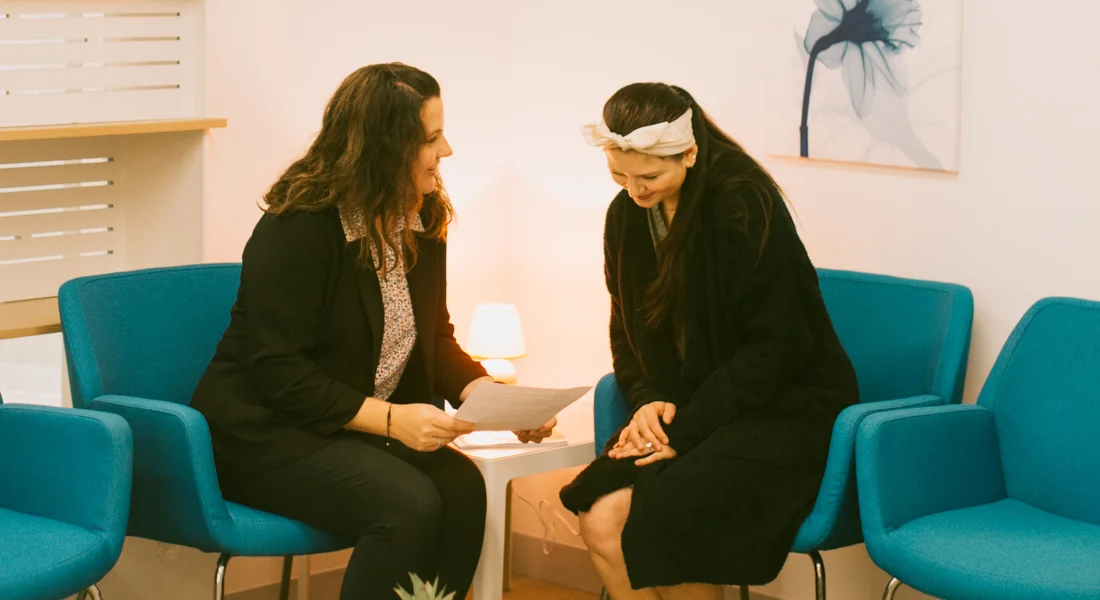 A career services professional meets with a student about externships.