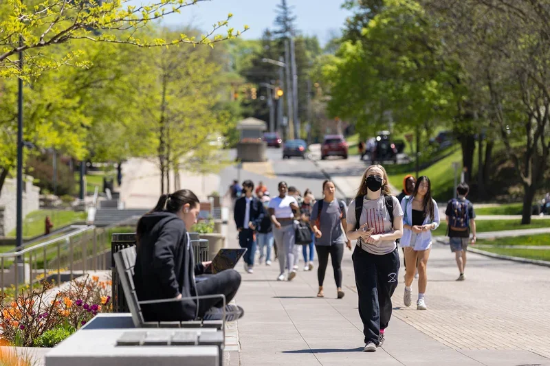 Students walking together on campus.