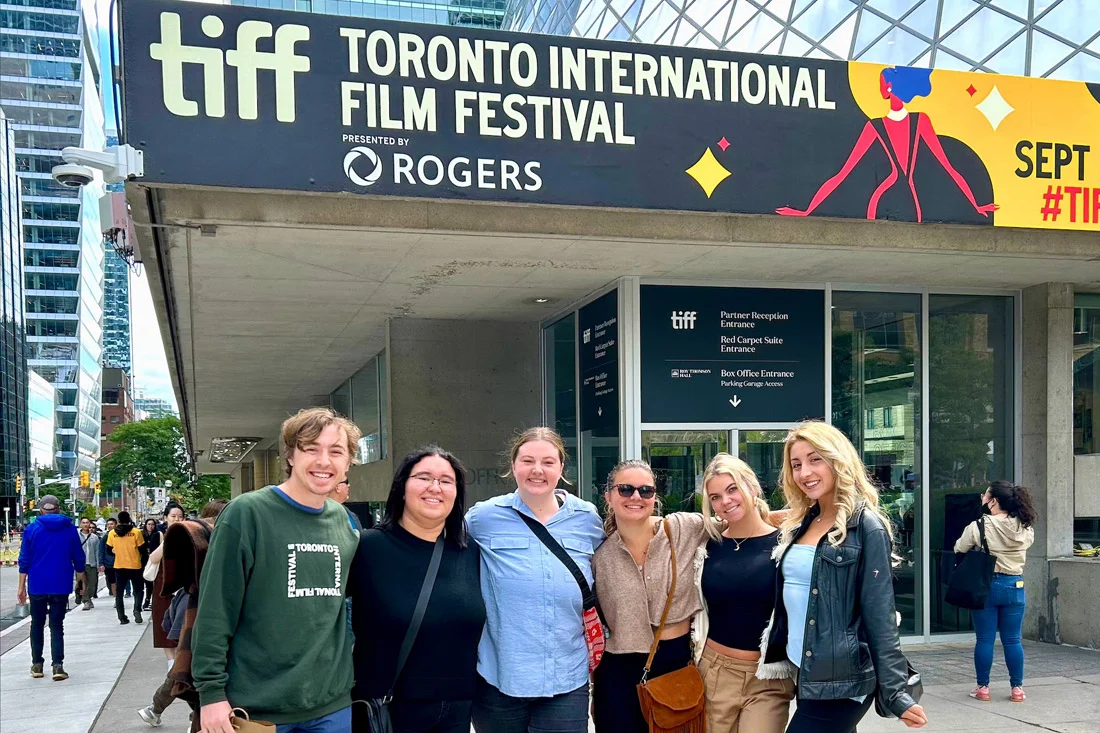 Students in the Goldring Arts Journalism program pose for a group photo at the Toronto International Film Festival.