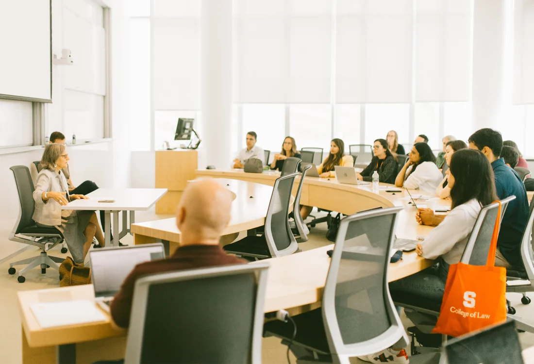 Students sit in a classroom lecture.