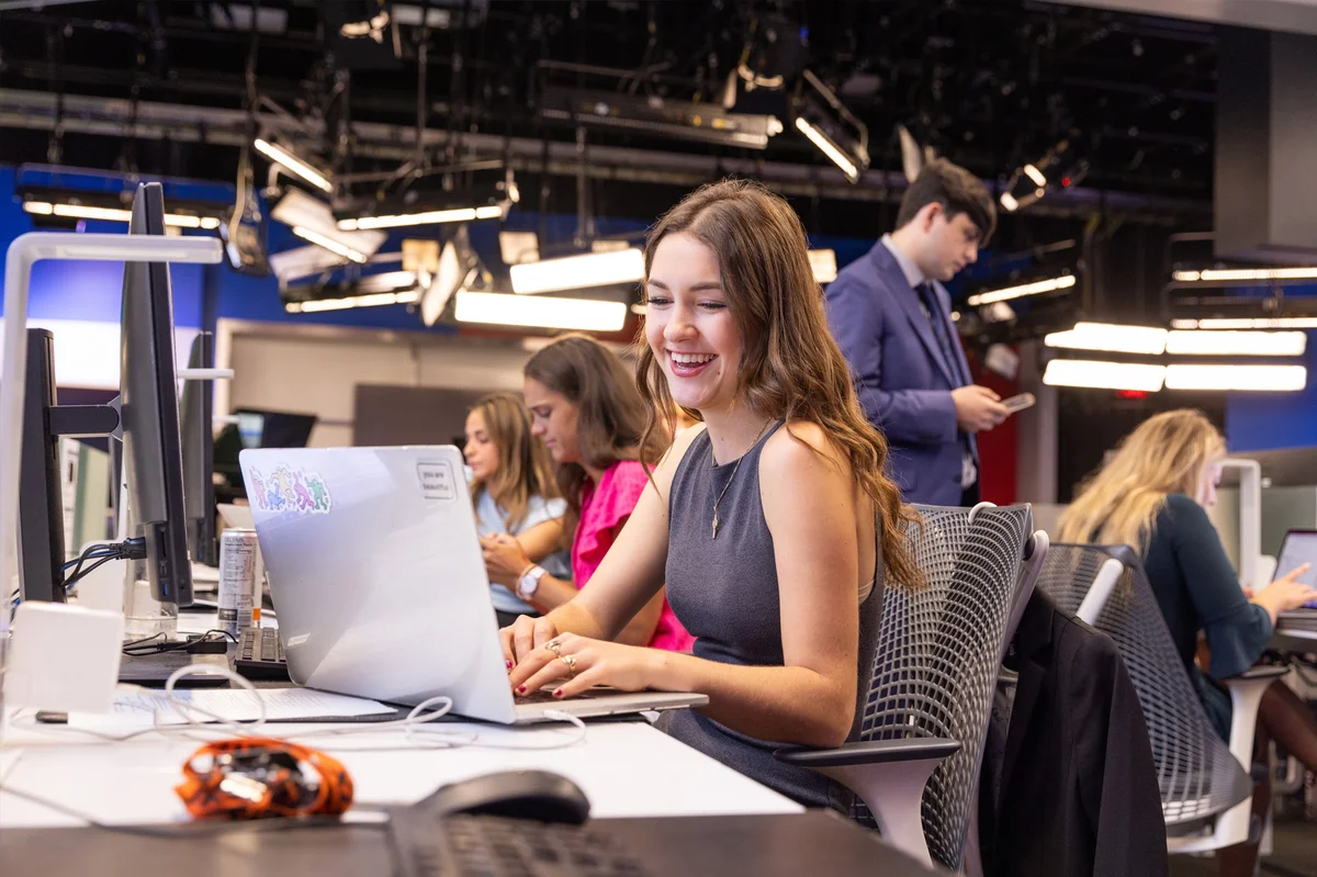 A student types on a computer during a class